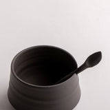 Small black tin by Atelier CAMINADA