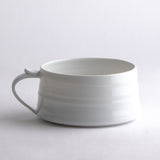Cappuccino Tasse mit verspieltem Henkel