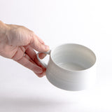 Cappuccino Tasse mit verspieltem Henkel