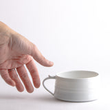 Cappuccino Tasse mit verspieltem Henkel